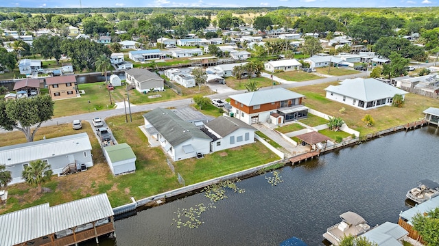3014 SE 25th St, Okeechobee, FL 34974 - birds eye view of property featuring a residential view and a water view