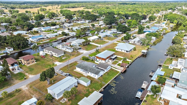3014 SE 25th St, Okeechobee, FL 34974 - drone / aerial view with a water view and a residential view