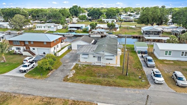 3014 SE 25th St, Okeechobee, FL 34974 - birds eye view of property featuring a residential view and a water view