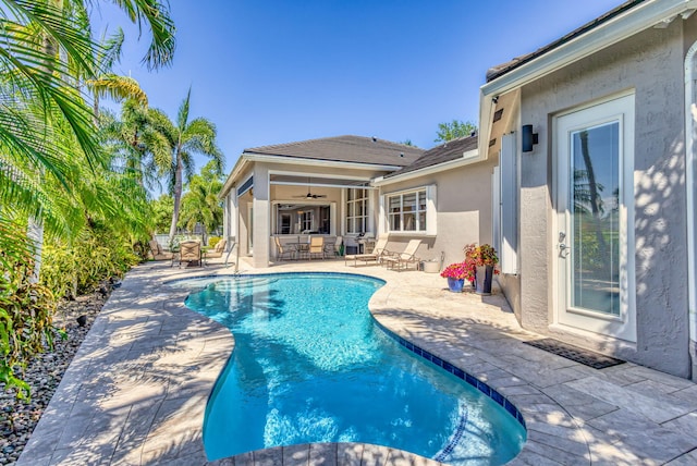 view of pool with ceiling fan, outdoor dining area, a fenced in pool, fence, and a patio
