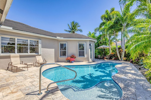 pool featuring a patio