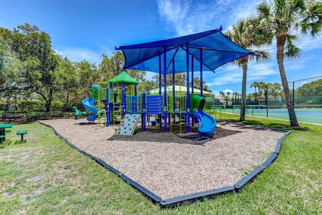 community jungle gym with fence