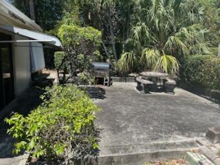 1156 W 33rd St, Riviera Beach, FL 33404 - view of yard with a patio area