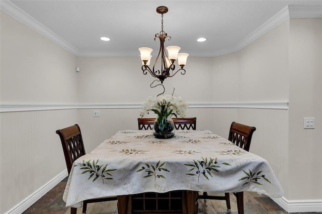 4160 Juniper Ter, Boynton Beach, FL 33436 - dining area with ornamental molding, stone finish flooring, a notable chandelier, and wainscoting