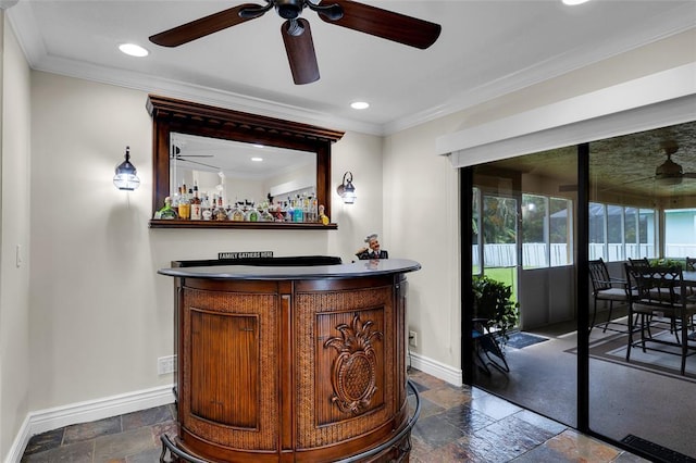 4160 Juniper Ter, Boynton Beach, FL 33436 - bar featuring ceiling fan, stone tile flooring, a dry bar, baseboards, and ornamental molding