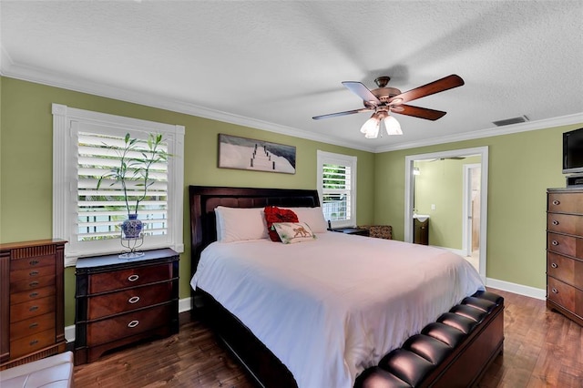 4160 Juniper Ter, Boynton Beach, FL 33436 - bedroom with a textured ceiling, visible vents, ornamental molding, and dark wood-style flooring