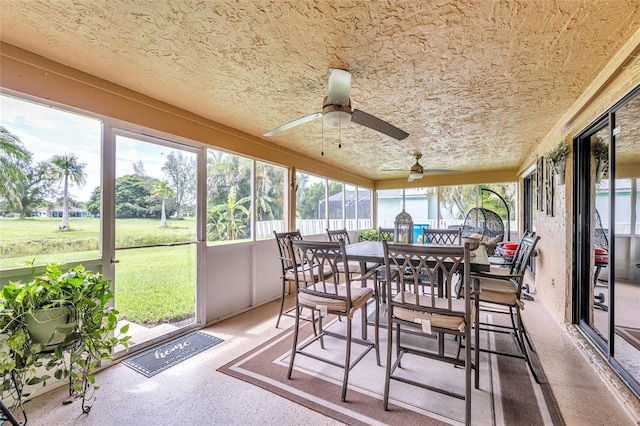 4160 Juniper Ter, Boynton Beach, FL 33436 - sunroom / solarium with outdoor dining area, a wealth of natural light, and ceiling fan