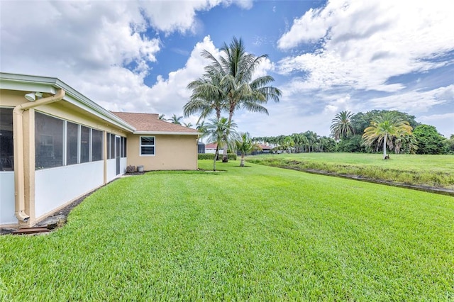 4160 Juniper Ter, Boynton Beach, FL 33436 - view of yard featuring a sunroom