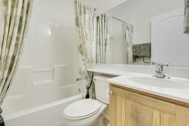 full bath featuring toilet, vanity, and shower / bathtub combination with curtain