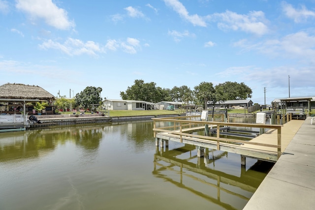 dock area featuring a water view and boat lift