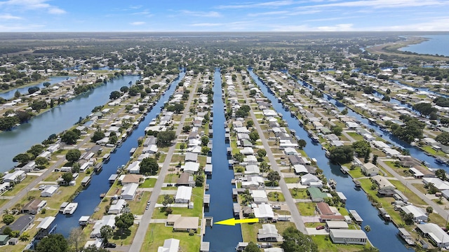 aerial view featuring a residential view and a water view