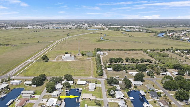 bird's eye view featuring a rural view and a water view