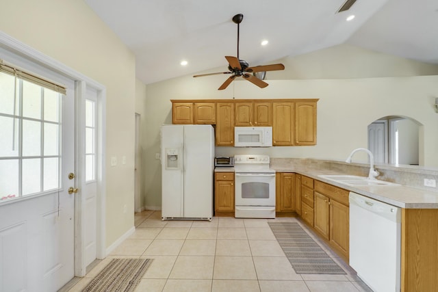 kitchen featuring ceiling fan, lofted ceiling, a sink, and white appliances