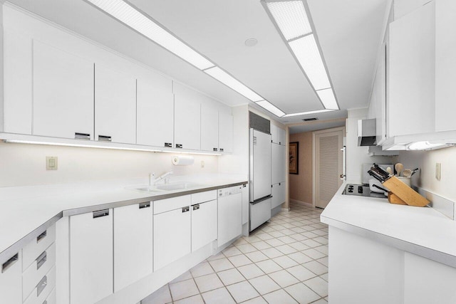 100 Lakeshore Dr Unit 1557, North Palm Beach, FL 33408 - kitchen with built in refrigerator, light countertops, white dishwasher, and a sink