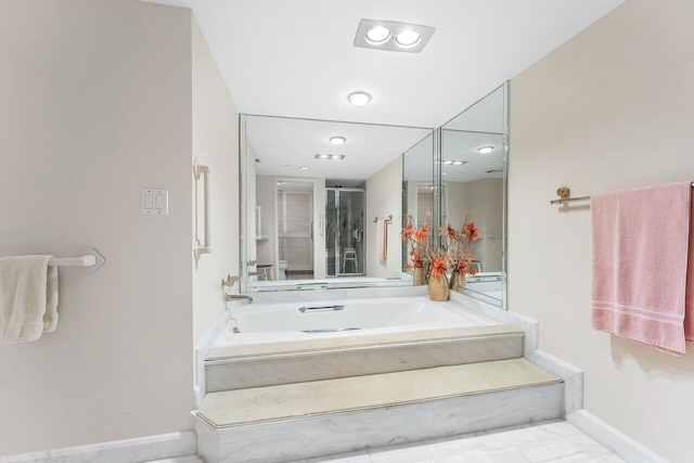 100 Lakeshore Dr Unit 1557, North Palm Beach, FL 33408 - bathroom featuring a bath, marble finish floor, a shower stall, and baseboards