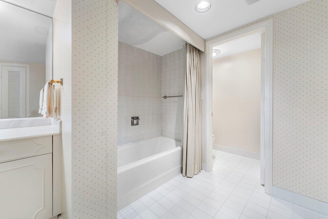 100 Lakeshore Dr Unit 1557, North Palm Beach, FL 33408 - full bath featuring tile patterned flooring, wallpapered walls, toilet, vanity, and baseboards