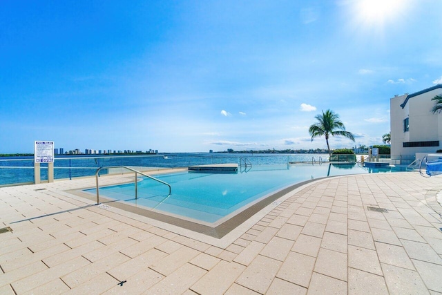 100 Lakeshore Dr Unit 1557, North Palm Beach, FL 33408 - pool with a patio area