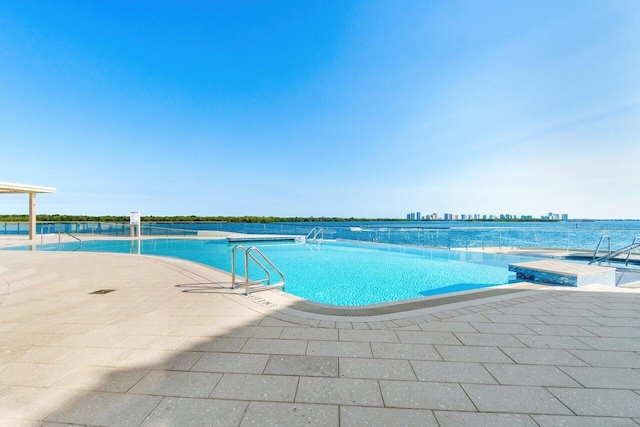 100 Lakeshore Dr Unit 1557, North Palm Beach, FL 33408 - pool with a patio area