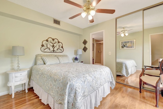 3718 Victoria Dr, West Palm Beach, FL 33406 - bedroom featuring a closet, light wood finished floors, a ceiling fan, and baseboards