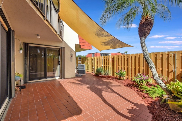 3718 Victoria Dr, West Palm Beach, FL 33406 - view of patio / terrace with fence and central air condition unit