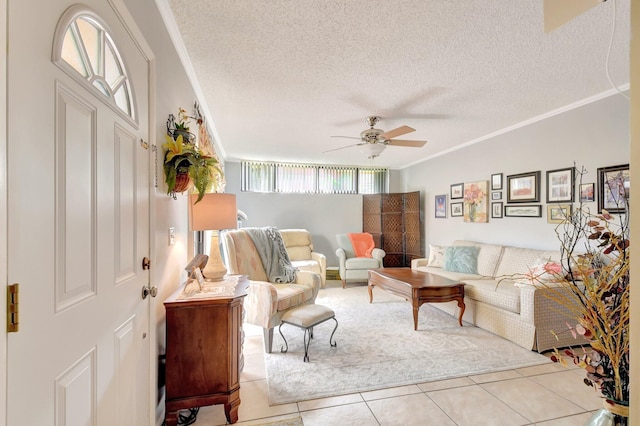 3718 Victoria Dr, West Palm Beach, FL 33406 - tiled living room with ceiling fan, a textured ceiling, and ornamental molding