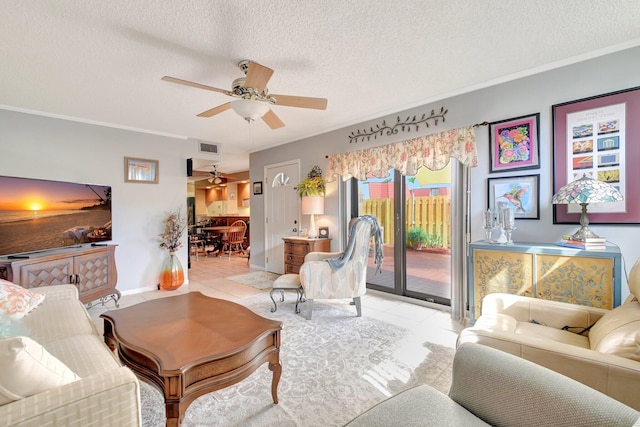 3718 Victoria Dr, West Palm Beach, FL 33406 - living room featuring ceiling fan, a textured ceiling, tile patterned floors, and ornamental molding