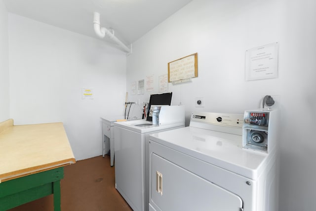 community laundry room featuring independent washer and dryer