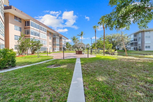 surrounding community with a yard