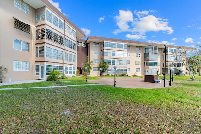2951 NW 46th Ave Unit 306, Lauderdale Lakes, FL 33313 - view of apartment building / complex