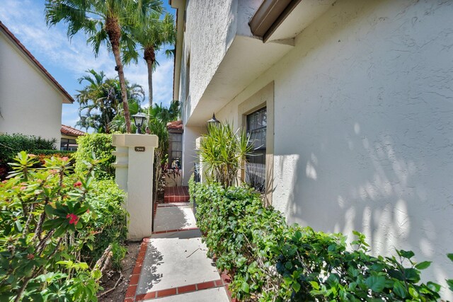 7940 La Mirada Dr, Boca Raton, FL 33433 - entrance to property with a gate and stucco siding