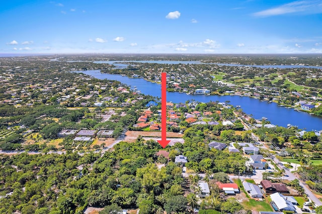 aerial view featuring a residential view and a water view
