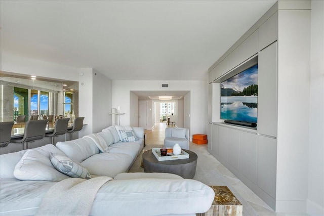 3720 S Ocean Blvd Unit 603, Highland Beach, FL 33487 - living room featuring visible vents