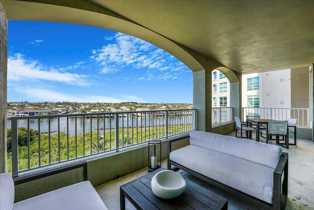 3720 S Ocean Blvd Unit 603, Highland Beach, FL 33487 - balcony with outdoor lounge area and a water view