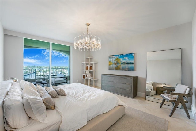 3720 S Ocean Blvd Unit 603, Highland Beach, FL 33487 - bedroom featuring an inviting chandelier, access to outside, and light carpet