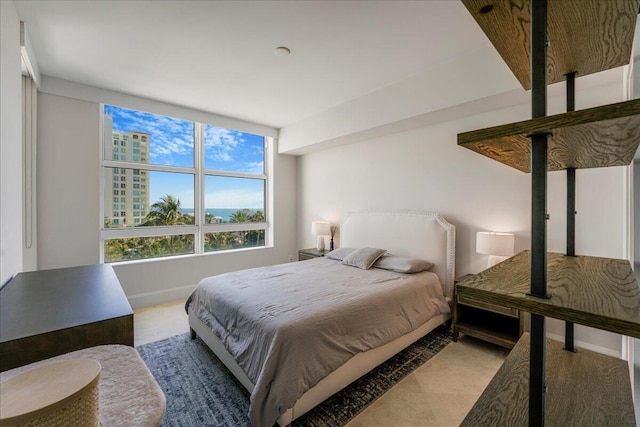 3720 S Ocean Blvd Unit 603, Highland Beach, FL 33487 - bedroom featuring baseboards and carpet