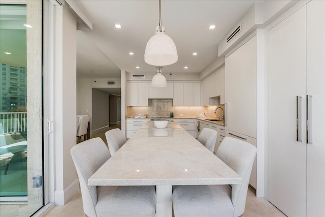 3720 S Ocean Blvd Unit 603, Highland Beach, FL 33487 - dining area featuring recessed lighting, visible vents, and baseboards