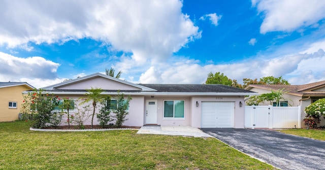3338 NW 69th St, Fort Lauderdale, FL 33309 - ranch-style house featuring a gate, a front lawn, aphalt driveway, a garage, and stucco siding