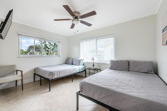 3338 NW 69th St, Fort Lauderdale, FL 33309 - bedroom featuring light tile patterned floors, ceiling fan, baseboards, and ornamental molding