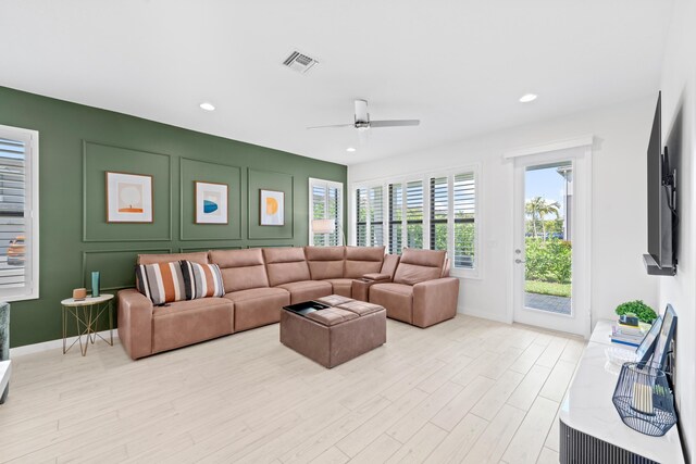 8781 Corvus Dr, Lake Worth, FL 33467 - living area featuring recessed lighting, wood finished floors, visible vents, a ceiling fan, and baseboards