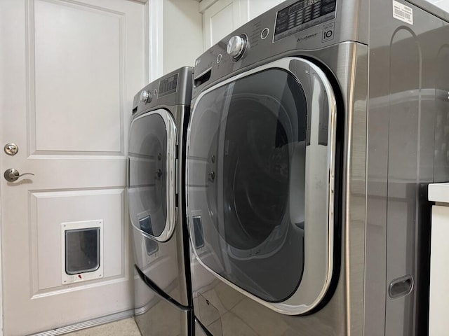 laundry area featuring separate washer and dryer