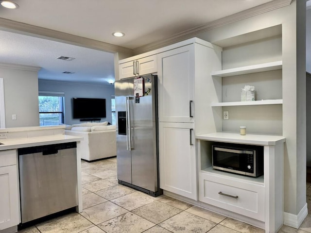 kitchen featuring stainless steel appliances, crown molding, light countertops, recessed lighting, and white cabinets