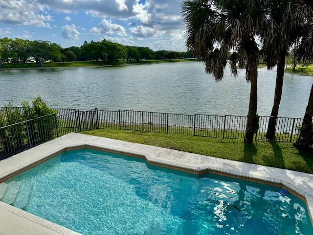 view of pool with a water view