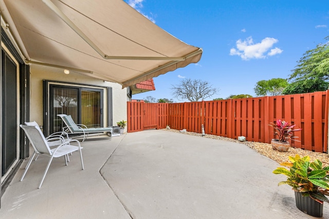 view of patio with a fenced backyard