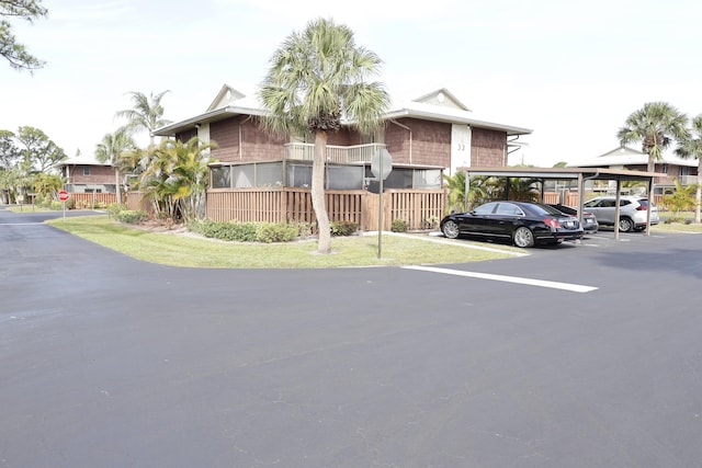 3302 SE Guinevere Ln, Port Saint Lucie, FL 34952 - view of property with covered parking