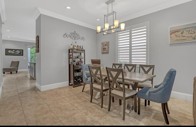 5959 SE Crooked Oak Ave, Hobe Sound, FL 33455 - dining area with crown molding, a chandelier, light tile patterned floors, baseboards, and recessed lighting