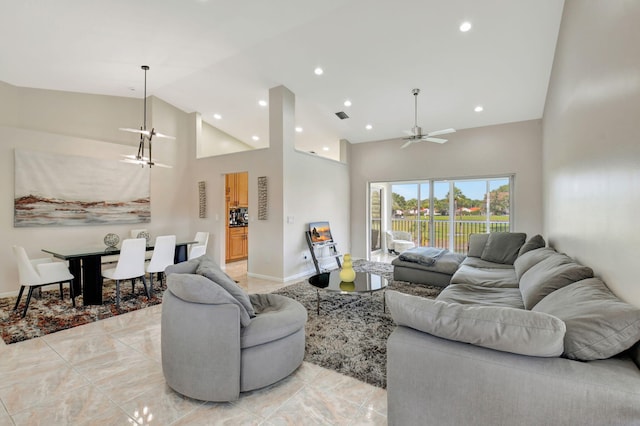 17051 Emile St Unit 5, Boca Raton, FL 33487 - living room featuring recessed lighting, visible vents, baseboards, high vaulted ceiling, and ceiling fan with notable chandelier