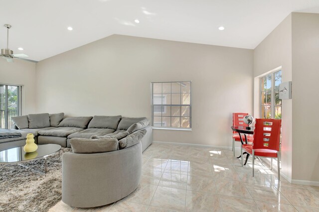 17051 Emile St Unit 5, Boca Raton, FL 33487 - living area featuring recessed lighting, a healthy amount of sunlight, marble finish floor, and baseboards
