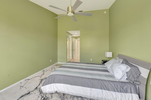 17051 Emile St Unit 5, Boca Raton, FL 33487 - carpeted bedroom with a ceiling fan, baseboards, and high vaulted ceiling