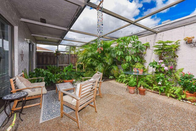 view of patio / terrace featuring fence
