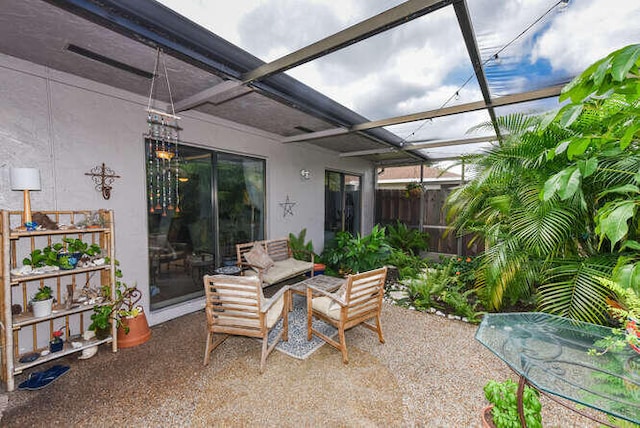 view of patio featuring an outdoor hangout area and a lanai